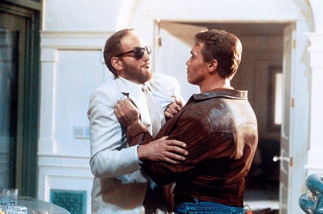 Charles Dance, Arnold Schwarzenegger