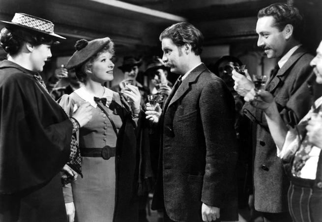 Robert Donat, Greer Garson, Paul Henreid