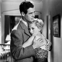 Tra le braccia di Robert Ryan in La seduttrice (1950)